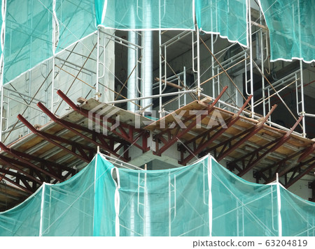 Catch platform or other construction projection from the face of a building. It is protect individuals and property from falling debris during construction. Catch platform or other construction projection from the face of a building. It is protect individuals and property from falling debris during construction. 63204819
