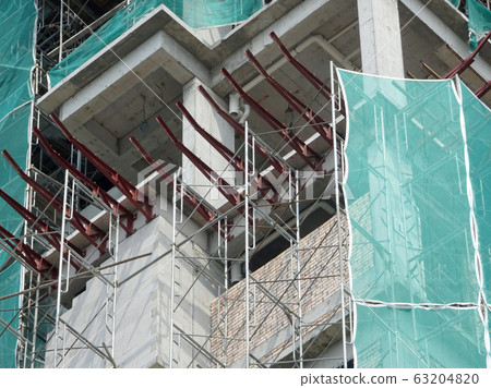 Catch platform or other construction projection from the face of a building. It is protect individuals and property from falling debris during construction. Catch platform or other construction projection from the face of a building. It is protect individuals and property from falling debris during construction. 63204820