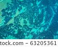 Aerial drone view of rocky coastline and sea. 63205361