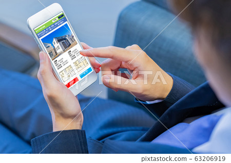 Internet search for housing information on smartphone 63206919