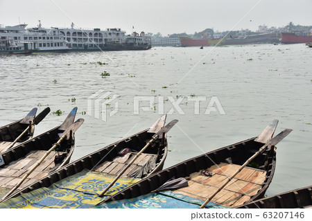 Dhaka, Bangladesh Shord Gat at the dock Boat ferry boat on the Brigonga river Streets along the river 63207146