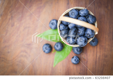 Fresh blueberry in basket / Top view blueberries 63208407