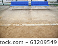 Playground sand with blue bench 63209549