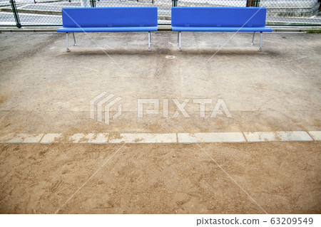 Playground sand with blue bench 63209549