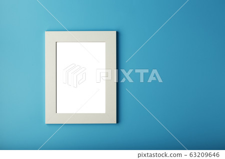 White and black photo frame with empty space on a White and black photo frame with empty space on a 63209646