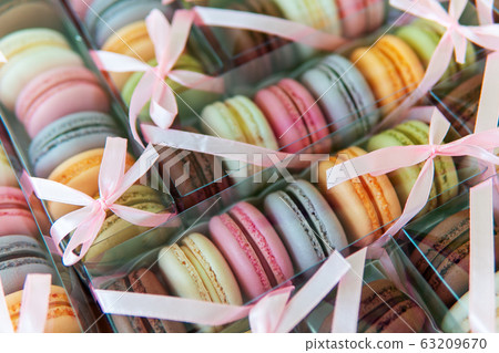 Macaroni cookies of different colors in a package Macaroni cookies of different colors in a package 63209670