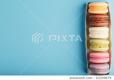 Macaroni cookies of different colors in a white 63209678