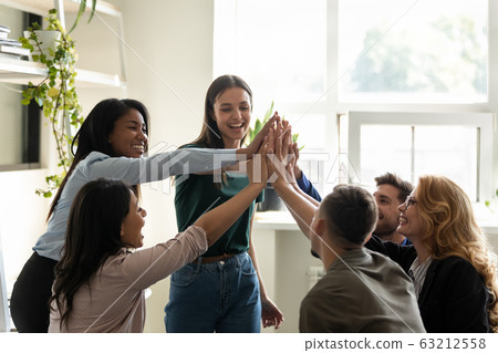 Associates giving high five starting project wish success each other 63212558