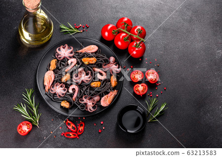 Black seafood pasta with shrimp and octopus Black seafood pasta with shrimp and octopus 63213583