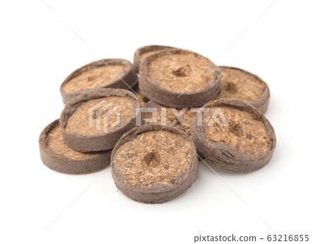 Pile of seed starting peat pellets 63216855