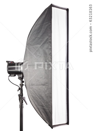 Photography studio flash with softbox isolated on white background with lamp. Photography studio flash with softbox isolated on white background with lamp. 63218163