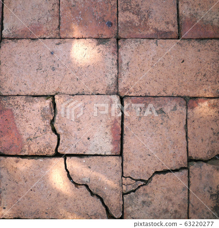 Cracked concrete texture closeup background 63220277