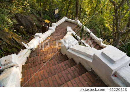 Luang Prabang Phu Si Hill Stairs leading to sunset spot 63220828