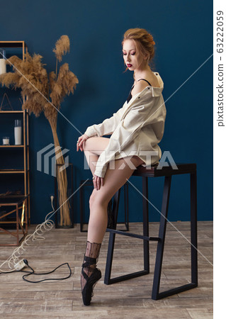 Sensual ballerina in white shirt 63222059