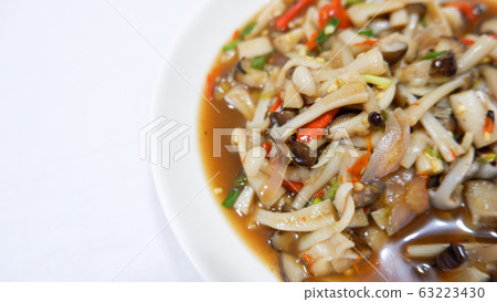 Mushroom chili paste in a tableware bowl. 63223430