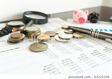 Business report and coin for review market share and budget 63225209