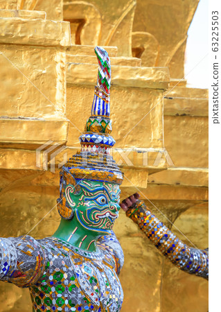 Demon or giant carring golden pagoda at Wat Phra Demon or giant carring golden pagoda at Wat Phra 63225503