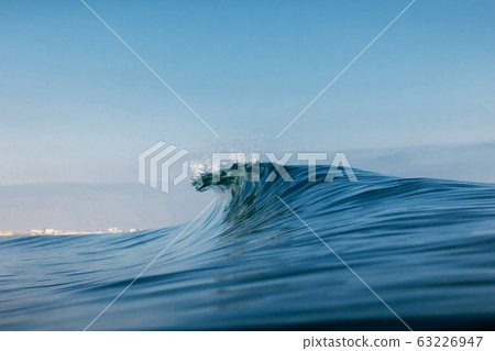 Ocean ideal wave in ocean. Breaking blue waves Ocean ideal wave in ocean. Breaking blue waves 63226947