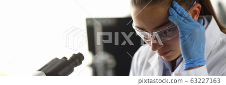 Medical female worker in white uniform 63227163