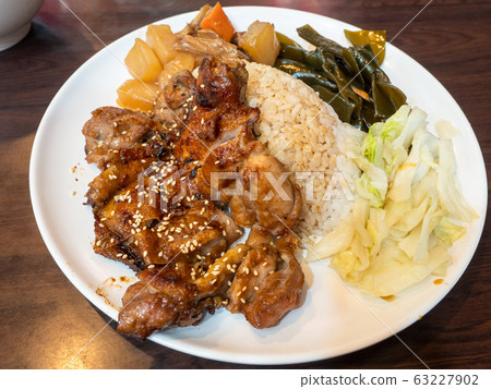 rice with grilled chicken on wood table rice with grilled chicken on wood table 63227902