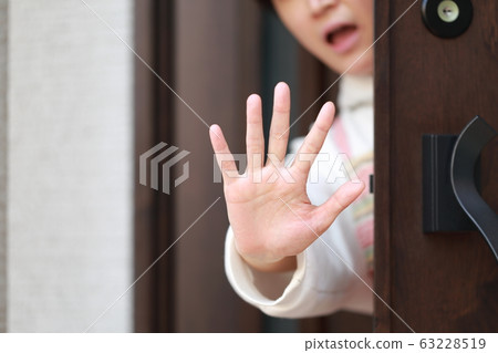 Housewife (female person entrance rejected hand NG copy space no face annoyance troubled stop no good mom) Housewife (female person entrance rejected hand NG copy space no face annoyance troubled stop no good mom) 63228519