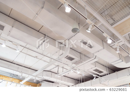 Ventilation ducts system painted in white composition of fire protection under the ceiling 63229081