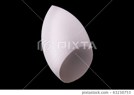 Makeup tool sponge or beauty blender isolated on black background 63230753