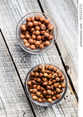 Hazelnuts with sugar icing. 63231353