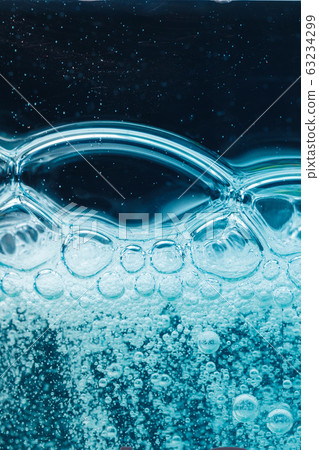 abstract liquid soap bubbles blue background abstract liquid soap bubbles blue background 63234299