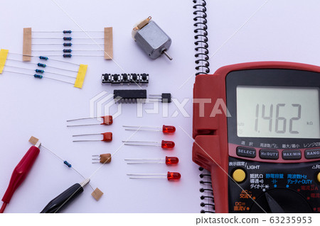 Image of electronic work. Electronic work parts on a sketchbook. Image of electronic work. Electronic work parts on a sketchbook. 63235953
