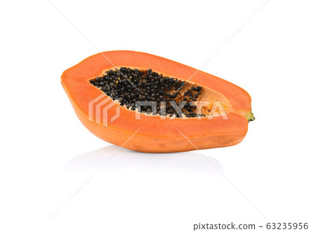 half of ripe papaya fruit with seeds isolated on 63235956