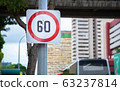 Metal Plate Traffic Sign: Speed limit 60 sign is shown as number in red circle on white background 63237814