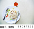 Traditional Asian Chinese Street Food: Khao Man Kai is Hainanese chicken rice and chicken meat 63237825