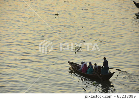 Dhaka, Bangladesh: A ferry that travels along the beautiful Asahi and Brigonga rivers. 63238099
