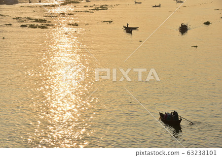 Dhaka, Bangladesh: A ferry that travels along the beautiful Asahi and Brigonga rivers. 63238101