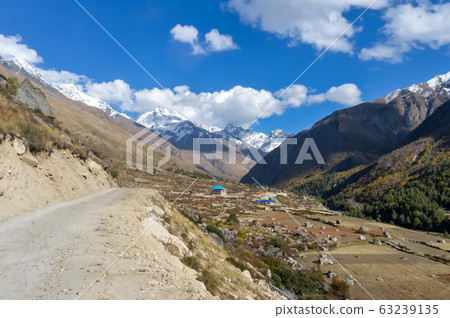 Beautiful greater Himalayas Valley with snow line peaks, alpine glaciers, river gorges 63239135