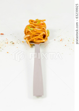 Classic pasta with tomato sauce on fork. Classic pasta with tomato sauce on fork. 63239925
