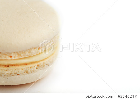 White macaroni cookies on a white background, 63240287
