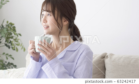 Woman getting up 63242417