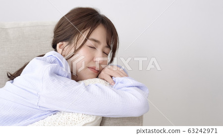 Woman pajamas napping 63242971