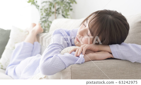 Woman pajamas napping Woman pajamas napping 63242975