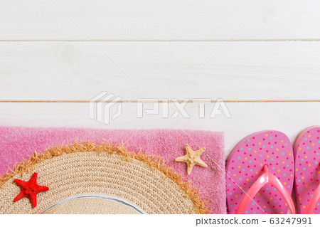 Travel and vacation accessories on a white wooden Travel and vacation accessories on a white wooden 63247991