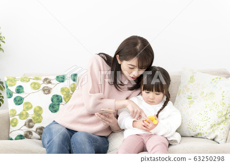 Parents and children image kids mobile phone Parents and children image kids mobile phone 63250298