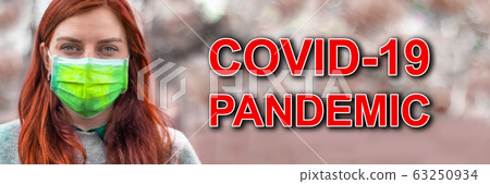 COVID-19 coronavirus text on blurred background. Red-haired white-skinned girl tourist in a medical mask. Travel and virus protection COVID-19 coronavirus text on blurred background. Red-haired white-skinned girl tourist in a medical mask. Travel and virus protection 63250934