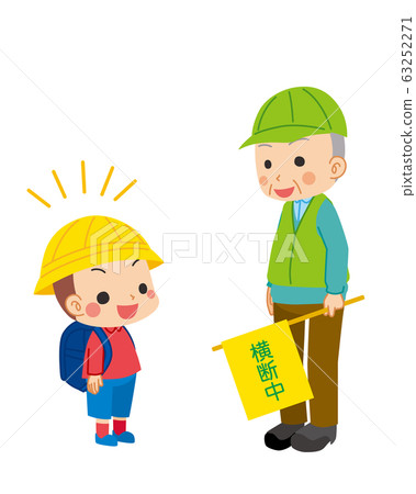 Elementary school boy greet the green uncle who guides traffic 63252271