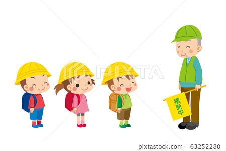 Elementary school students talking with a green man who guides traffic 63252280