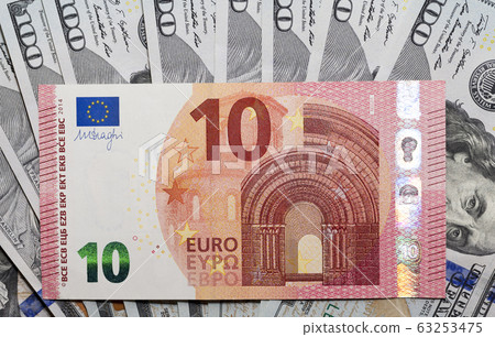 ten euros and 100 dollars ten euros and 100 dollars 63253475