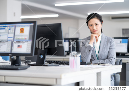 Middle age woman troubled in the office 63255577
