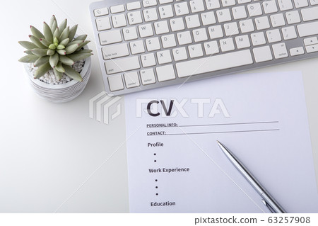 Curriculum vitae with pen on whtie desk Curriculum vitae with pen on whtie desk 63257908
