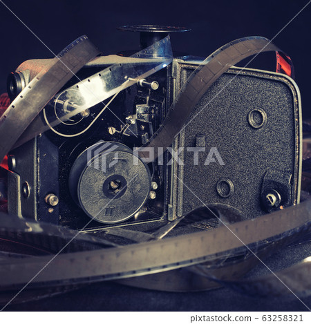 close-up of an old film and the insides of a close-up of an old film and the insides of a 63258321